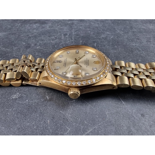 1135 - A 1973 Rolex 'Oyster Perpetual Datejust' 14ct gold wristwatch, with later diamond inset bezel and in... 