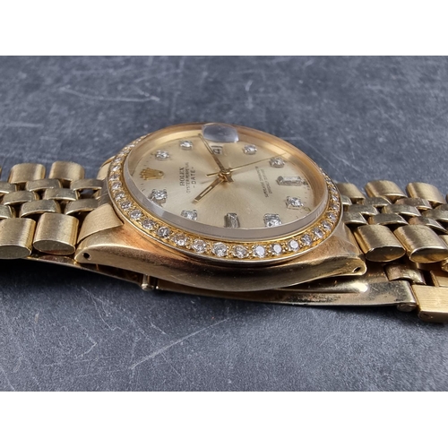 1135 - A 1973 Rolex 'Oyster Perpetual Datejust' 14ct gold wristwatch, with later diamond inset bezel and in... 