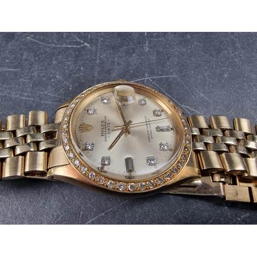 1135 - A 1973 Rolex 'Oyster Perpetual Datejust' 14ct gold wristwatch, with later diamond inset bezel and in... 