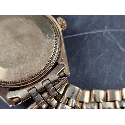 1135 - A 1973 Rolex 'Oyster Perpetual Datejust' 14ct gold wristwatch, with later diamond inset bezel and in... 