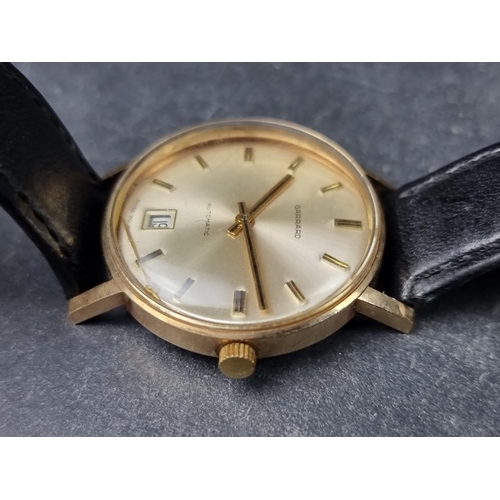 1143 - A vintage Garrard 9ct gold automatic wristwatch, 33mm, Ref. 72890, Cal. MS.R S76, on leather strap.... 