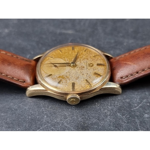 1144 - A 1950s Omega 9ct gold manual wind wristwatch, 33mm, on replacement leather strap, Cal 267. Serial N... 