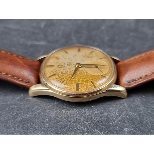 1144 - A 1950s Omega 9ct gold manual wind wristwatch, 33mm, on replacement leather strap, Cal 267. Serial N... 