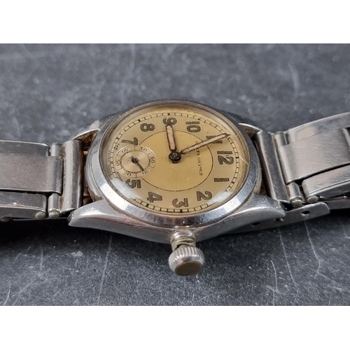 1150 - A 1940s Rolex Oyster stainless steel manual wind wristwatch, 29mm, Ref. 3121, on associated expandin... 