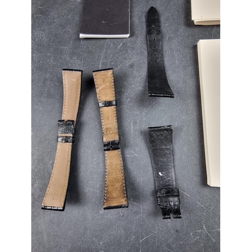 1154 - A group of three Patek Philippe leather watch straps, together with Patek Philippe headed paper and ... 