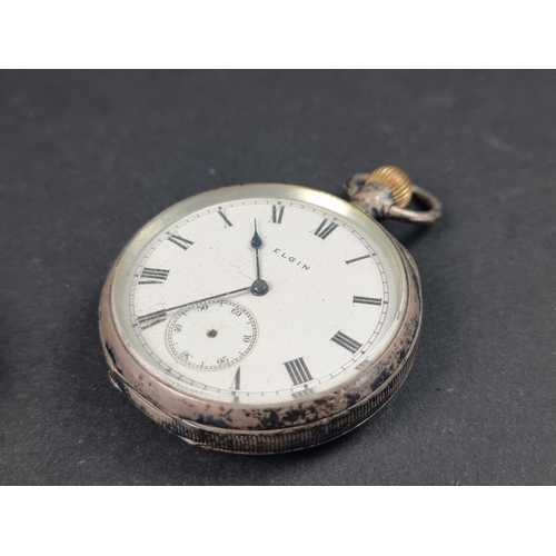 1175 - An Elgin silver open faced stem wind pocket watch, import mark London 1908, 50mm; together with a De... 