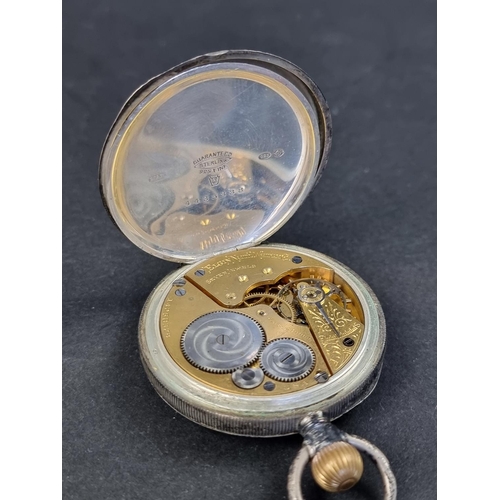 1175 - An Elgin silver open faced stem wind pocket watch, import mark London 1908, 50mm; together with a De... 