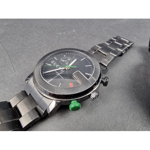 1183 - A Gucci 101M G-Chrono black PVD quartz wristwatch, 44mm; together with another wristwatch. (2)... 