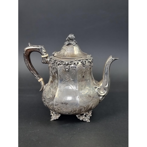 606 - A Victorian Scottish silver teapot, by J M, Glasgow 1854, 20cm high, gross weight 829g, (with ivory ... 