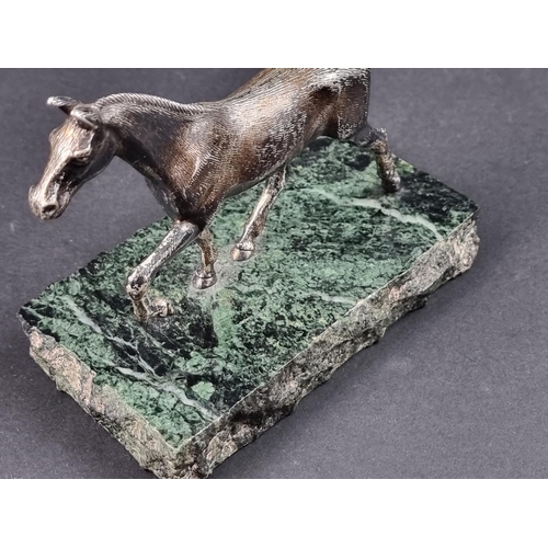 661 - A silver horse, by A E S, Birmingham 1973, on marble base, the base 17cm wide.