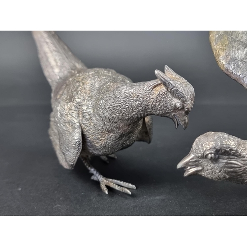 662 - A pair of cast silver pheasants, by Da-mar Silverware, London 1976, largest 22.5cm, 865g. (2)... 