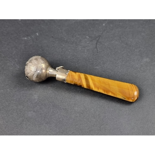 686 - A cased Victorian silver child's rattle, having tiger's eye handle, by George Unite, Birmingham 1888... 