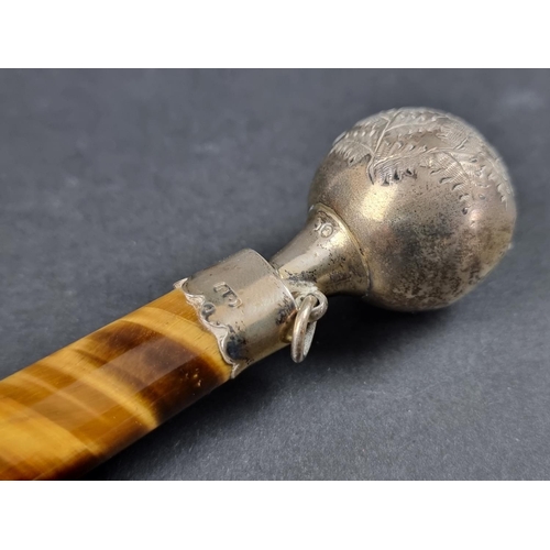 686 - A cased Victorian silver child's rattle, having tiger's eye handle, by George Unite, Birmingham 1888... 