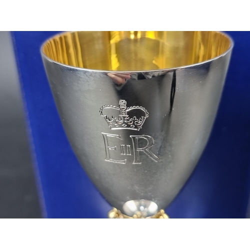 692 - An Elizabeth II 'Silver Jubilee' commemorative silver and parcel gilt goblet, by Mappin & Webb, ... 