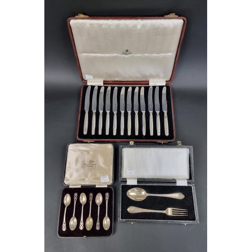 693 - A cased silver Christening fork and spoon, by Holland, Aldwinckle & Slater, London 1913; togethe... 