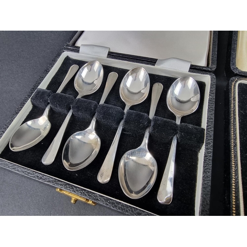 695 - A cased set of six silver rat tail coffee spoons, by C Robathan & Son, Birmingham 1979; together... 