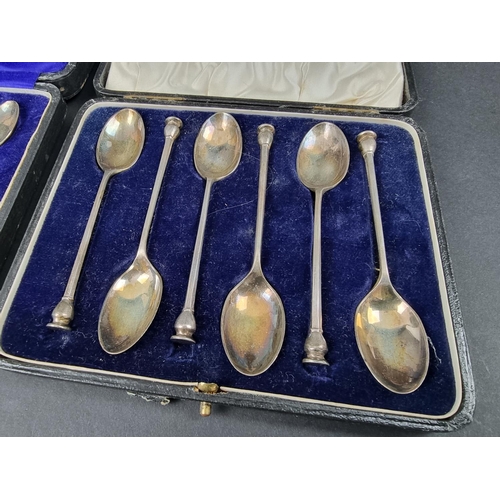 696 - A cased set of six silver teaspoons, by Mappin & Webb Ltd, Sheffield 1921; together with another... 