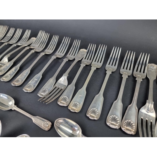 698A - A Victorian canteen of silver fiddle, thread and shell pattern cutlery, the majority by Chawner &... 