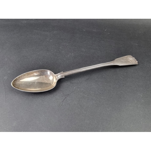 699 - A Victorian silver fiddle, thread and shell pattern basting spoon, by Elizabeth Eaton, London 1854, ... 