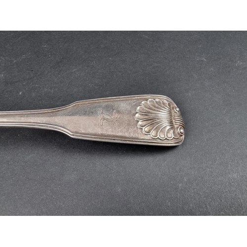 699 - A Victorian silver fiddle, thread and shell pattern basting spoon, by Elizabeth Eaton, London 1854, ... 