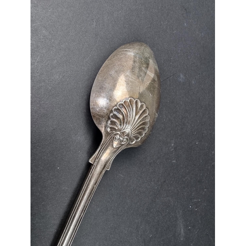 699 - A Victorian silver fiddle, thread and shell pattern basting spoon, by Elizabeth Eaton, London 1854, ... 