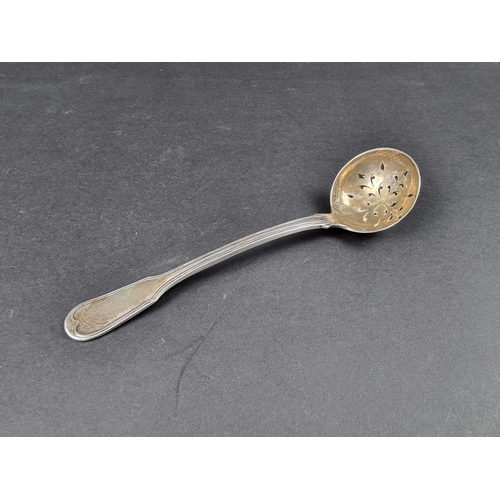 700 - A George III Scottish silver fiddle and thread pattern sifter spoon, Edinburgh 1818, 52g.... 