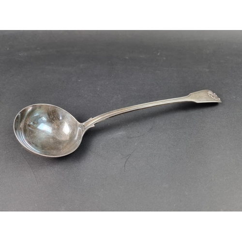 702 - A William IV silver fiddle, thread and shell pattern soup ladle, by Mary Chawner, London 1834, 300g.... 