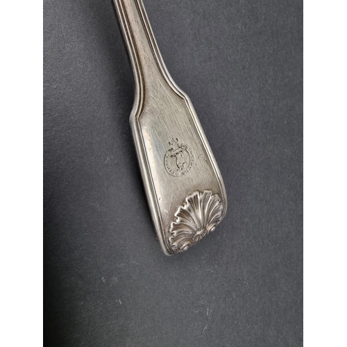 702 - A William IV silver fiddle, thread and shell pattern soup ladle, by Mary Chawner, London 1834, 300g.... 