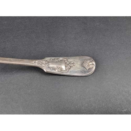 704 - A Victorian silver fiddle pattern soup ladle, by John James Whiting, London 1864, 33cm long, 269g.... 