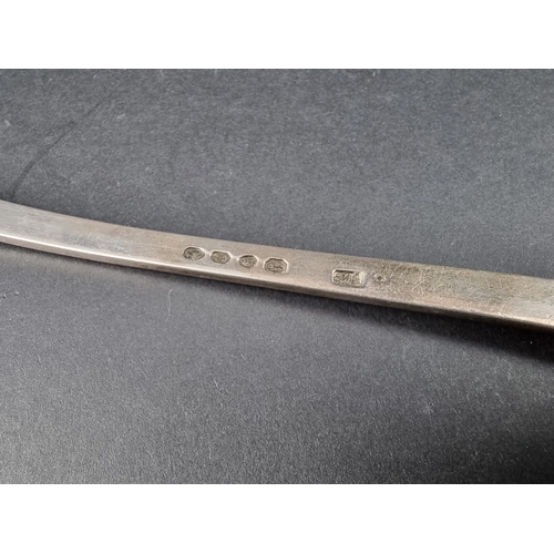 704 - A Victorian silver fiddle pattern soup ladle, by John James Whiting, London 1864, 33cm long, 269g.... 