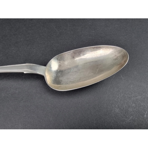 707 - A Colonial white metal table spoon, stamped 'FR' three times, 22cm long, 39.5g.