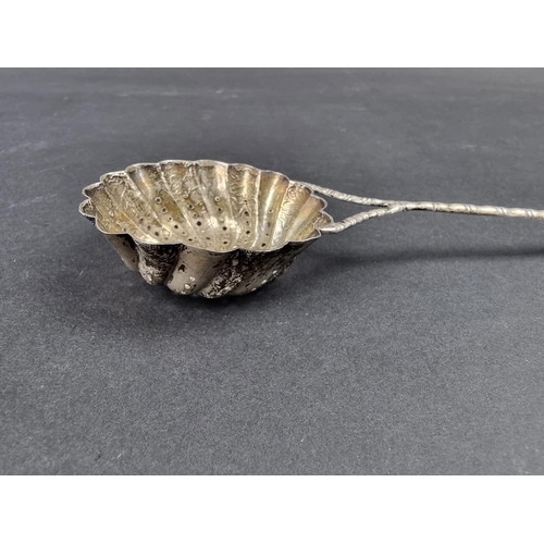 710 - A Chinese white metal sifter spoon, probably by Hung Chong & Co, 19.5cm long, 25g.... 