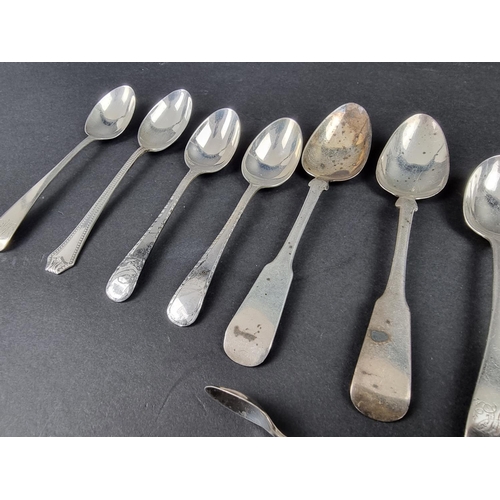 715 - Two Irish silver fiddle pattern teaspoons; together with nine other teaspoons; and a pair of sugar t... 