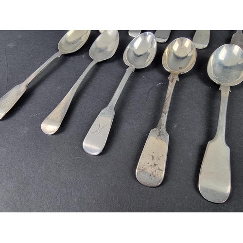 720 - Fifteen Georgian and later silver fiddle pattern teaspoons, 295g. (15)