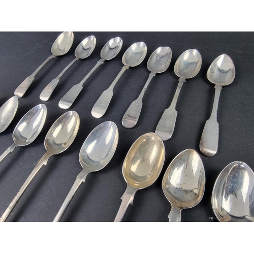 720 - Fifteen Georgian and later silver fiddle pattern teaspoons, 295g. (15)