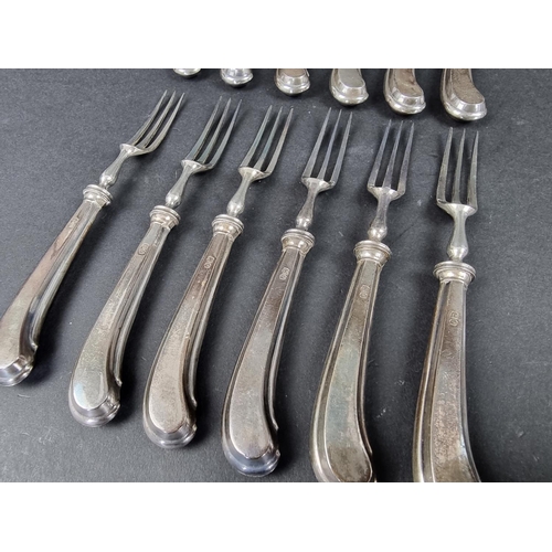 726 - A set of twelve silver handled pistol grip knives and forks, by William Hutton & Sons Ltd, Sheff... 