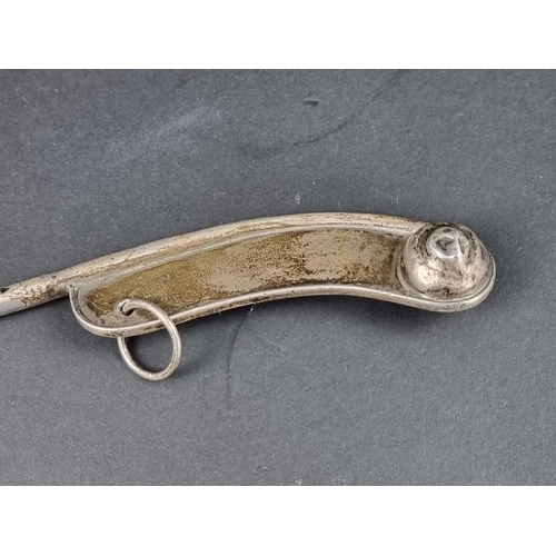 737 - A white metal bosun's whistle, stamped 'Coin, Boston', 13.5cm long, 28g.