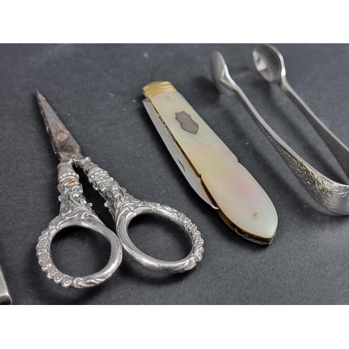 740 - A Victorian silver and mother-of-pearl fruit knife; together with a pair of scissors; a pair of silv... 