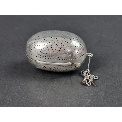 742 - A Victorian silver tea infuser, having gilt interior, with suspension chain and hook, by Thomas John... 