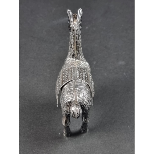 747 - A foreign white metal Llama, stamped '925', 10cm high.