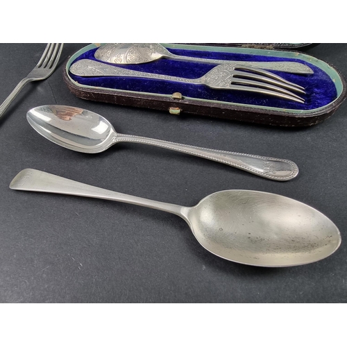 757 - A cased Victorian silver Christening fork and spoon, by Wakely & Wheeler, London 1893/4; togethe... 