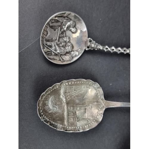 781 - A silver and mother-of-pearl trowel bookmark; together with two Continental metal spoons; and three ... 