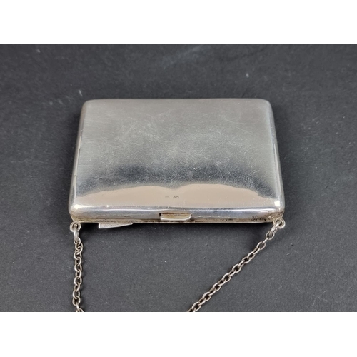 782 - A silver purse, by Boots Pure Drug Company, Birmingham, 9.5cm wide.