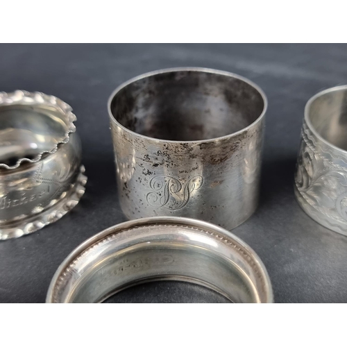 783 - A set of three silver napkin rings, by Francis Howard Ltd, Birmingham; together with five other silv... 