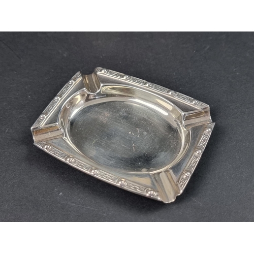 786 - A foreign metal bowl, stamped '84%', 10cm diameter; together with a silver ashtray, 9cm, 50g. (2)... 