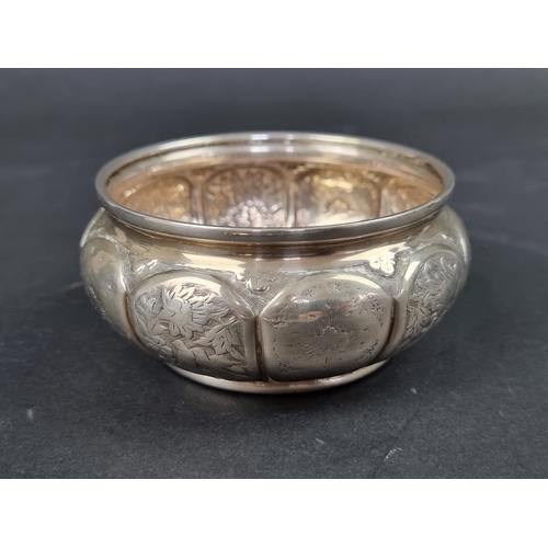 786 - A foreign metal bowl, stamped '84%', 10cm diameter; together with a silver ashtray, 9cm, 50g. (2)... 