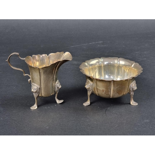 793 - An Irish silver cream jug and matching sugar bowl, by Wakely & Wheeler, Dublin 1922, jug 8.5cm h... 