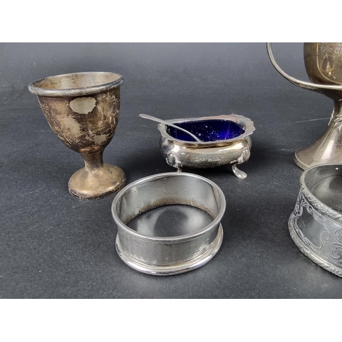 796 - A group of silver items, to include a four division silver toast rack, 398g. (15)