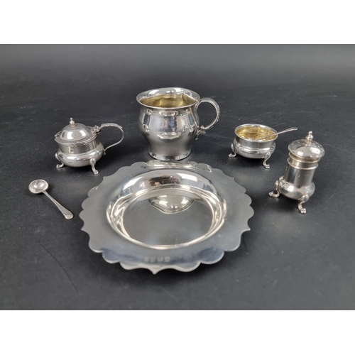 797 - A silver three piece cruet set, by James Deakin & Sons, date marks rubbed, (the two spoons by a ... 