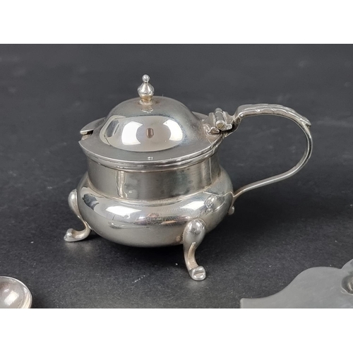 797 - A silver three piece cruet set, by James Deakin & Sons, date marks rubbed, (the two spoons by a ... 